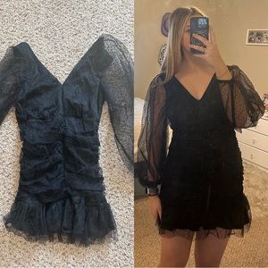 Black swiss dot long sleeve mini dress